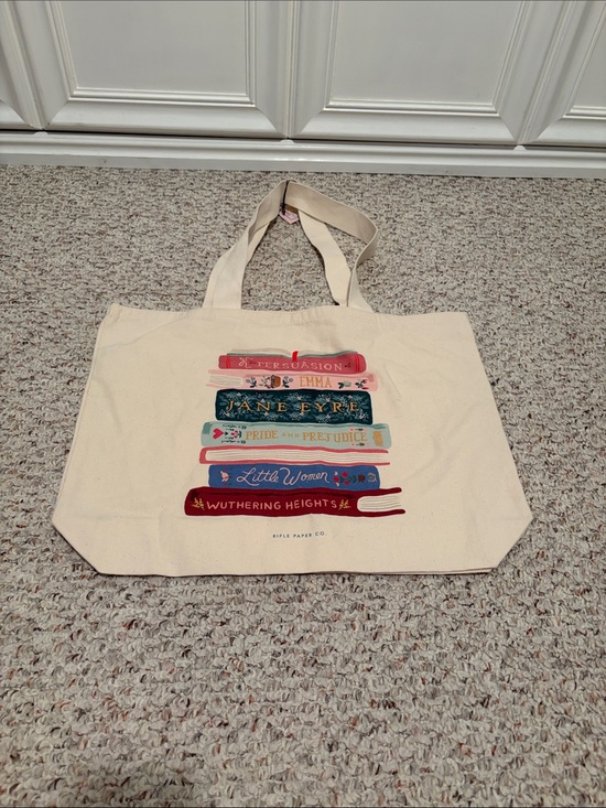 Rifle Paper Co. Handbags - Rifle Paper Co. Cream Canvas Tote with Colorful Bookstack Print
